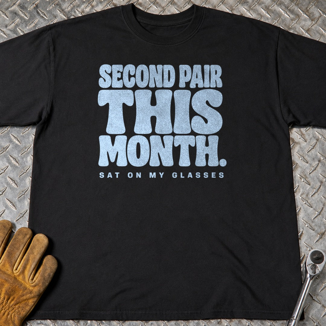Sat On Glasses t-shirt flat lay