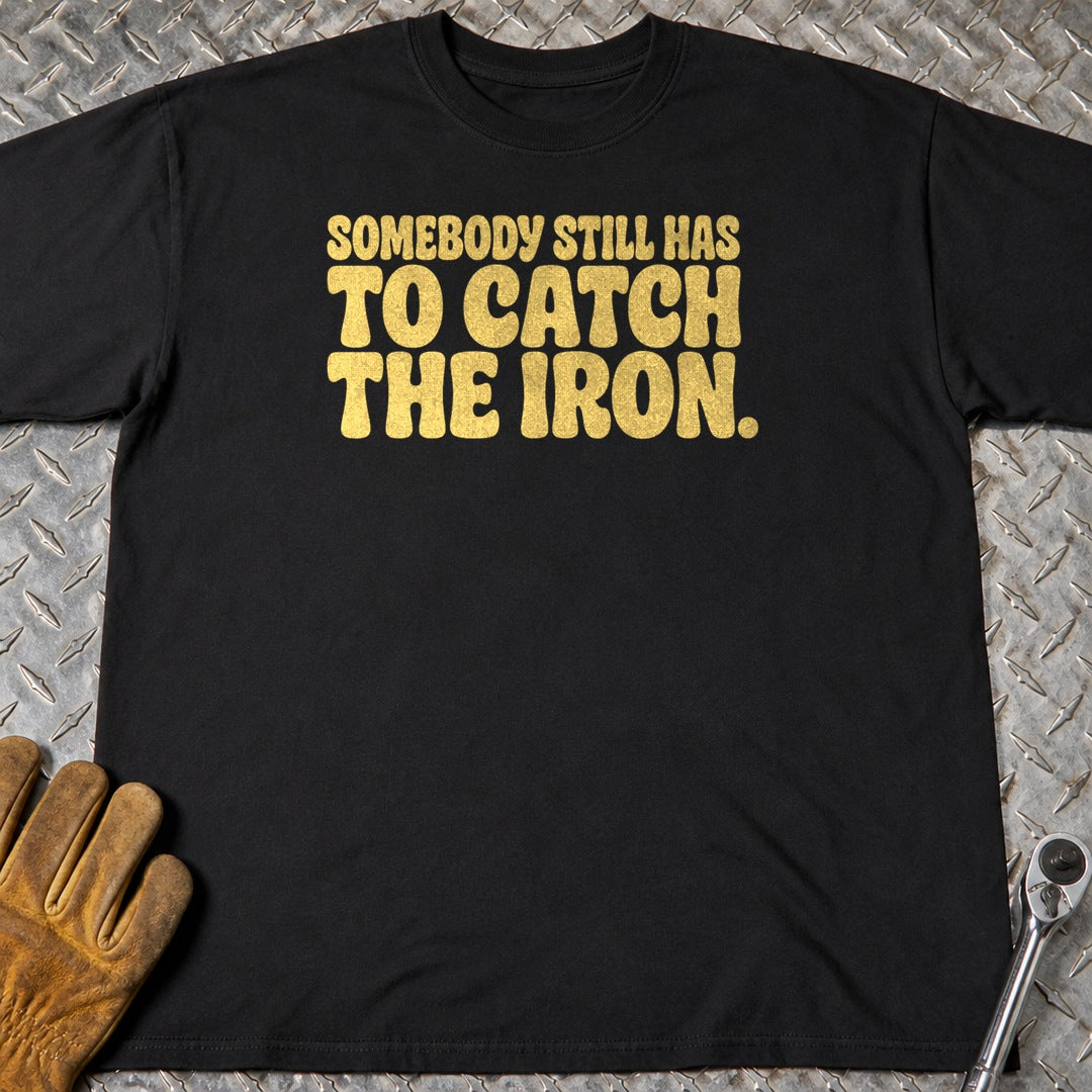 Catch The Iron t-shirt flat lay