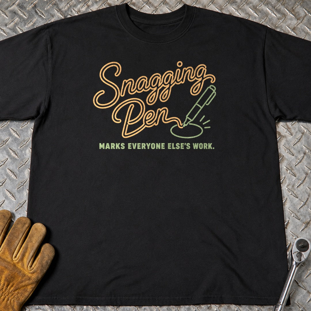 Snagging Pen t-shirt flat lay