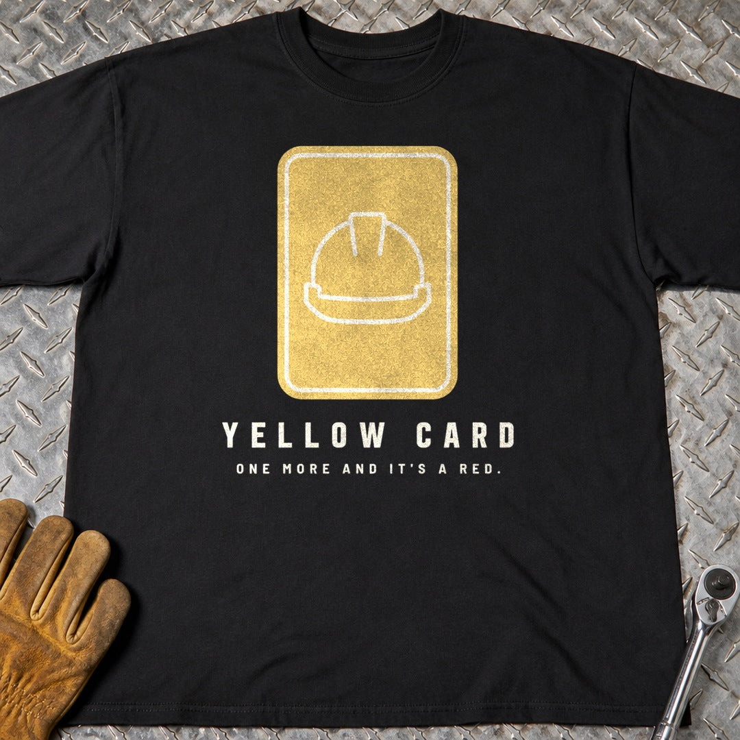 Yellow Card t-shirt flat lay