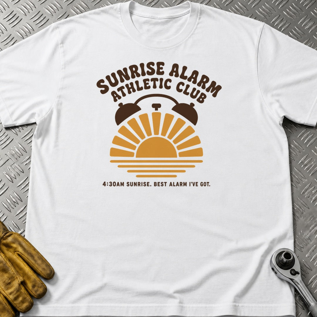Sunrise Alarm t-shirt flat lay